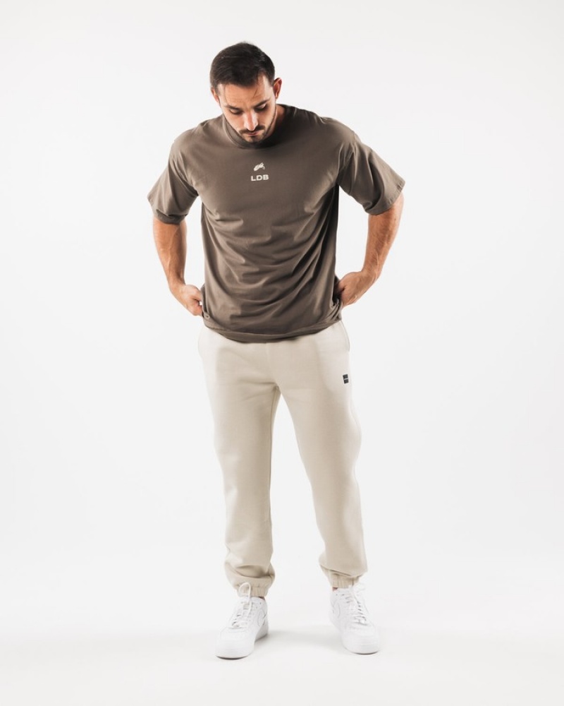 Alphalete Academy Relaxed Uomo Pantaloni Jogger Beige | 67NJVOHAQ