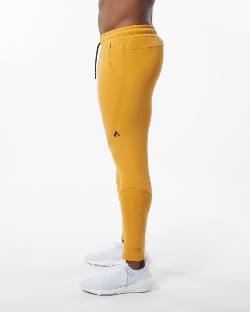 Alphalete ELMTS Cuffed Uomo Pantaloni Jogger Gialle | 12MXEYGOQ