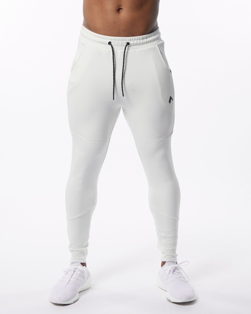 Alphalete ELMTS Zip Uomo Pantaloni Jogger Crema | 01MDSJUBO
